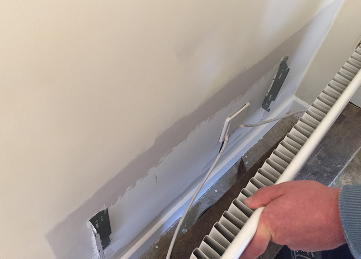 how to paint behind a radiator